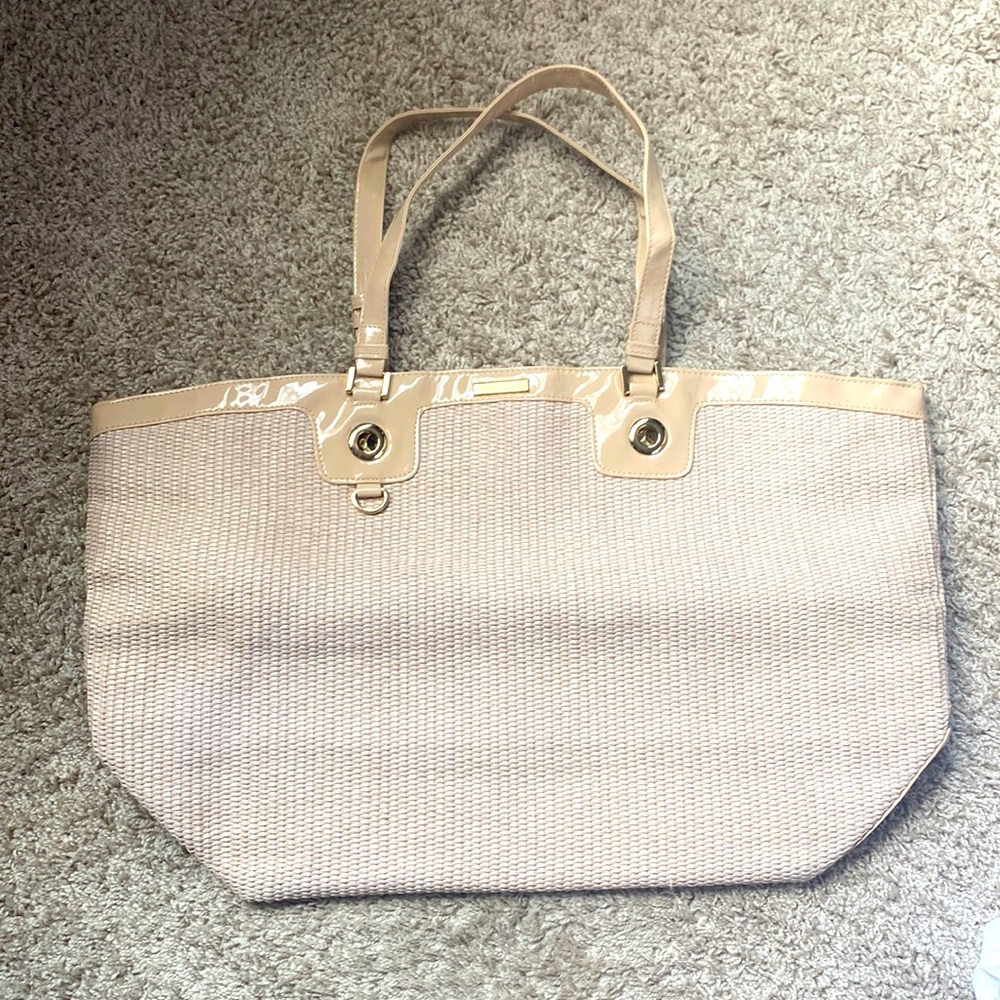 Versace parfums straw type bag. Can be used casually or for the beach.